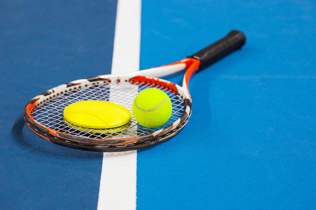 The tennis ball on a tennis court